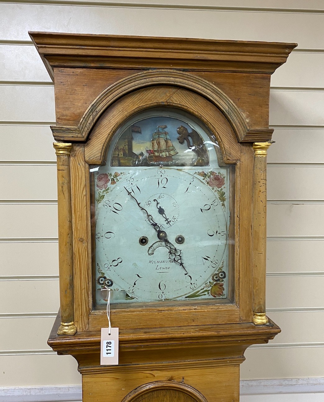 An early 19th century oak and pine 8 day longcase clock, the painted arched dial marked Wilmshurst, Lewes, height 207cm